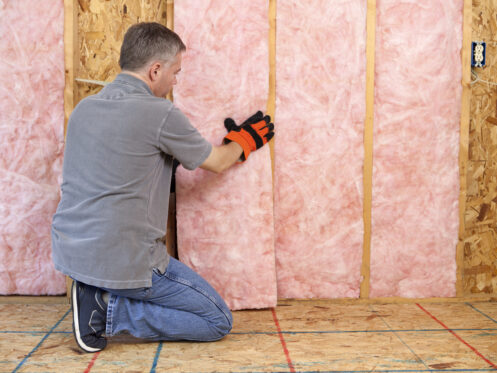 Attic insulation being installed in a Dallas, GA home