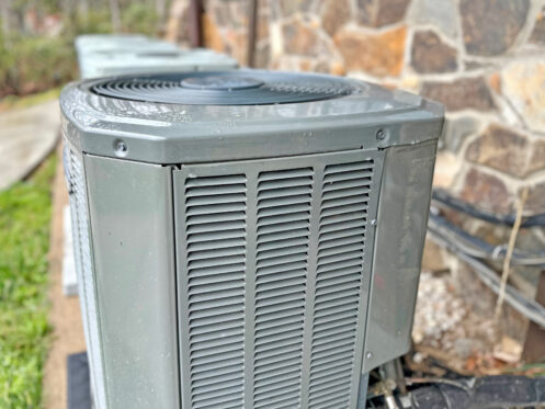 An AC system in a backyard in Atlanta, GA